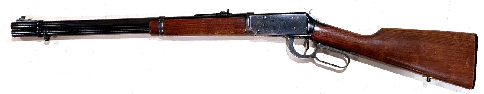 Winchester Model 94 lever-action carbine, right side, on a white background.