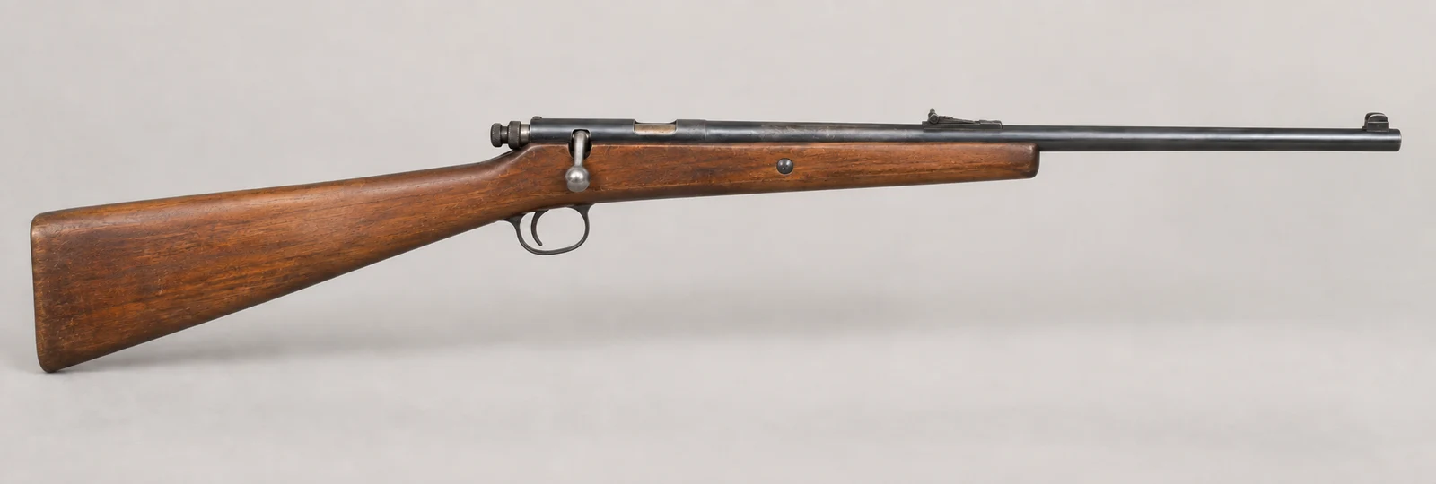 AI-generated illustration of Winchester Model 1900, side profile on a light gray background.